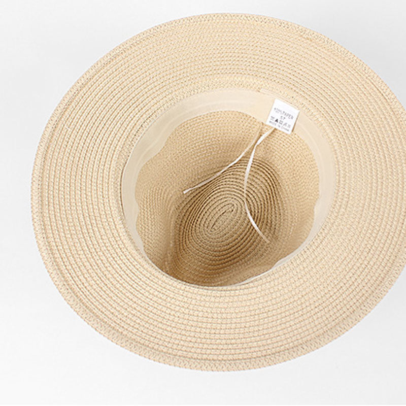 Elegant Straw for your Style: Highlights the versatility of the hat and its ability to complement different styles.