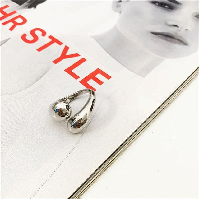 Double Drop Ring Minimalist design: A unique touch for your look.