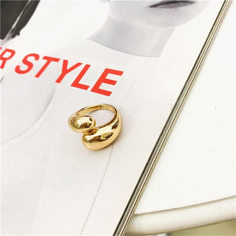 Double Drop Ring Minimalist design: A unique touch for your look.