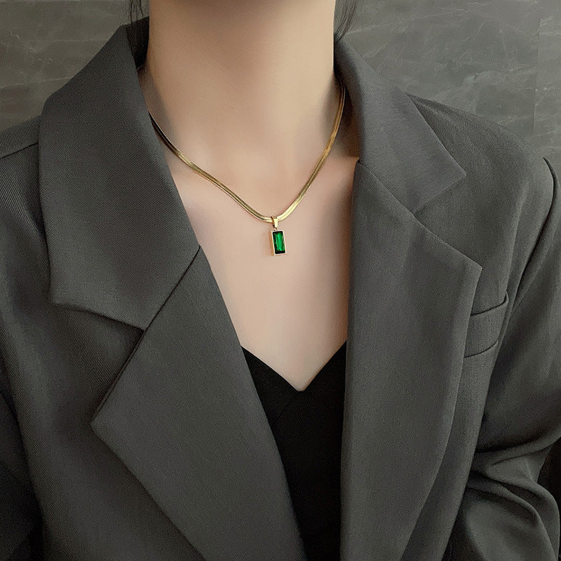 Radiant elegance: Emerald pendant necklace in stainless steel. Gift Jewelry