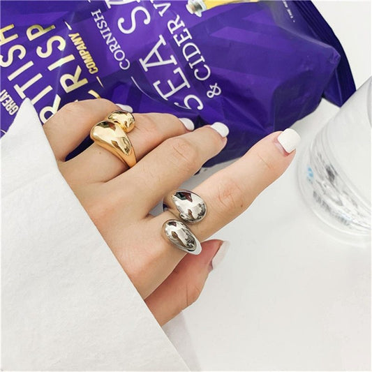 Double Drop Ring Minimalist design: A unique touch for your look. 